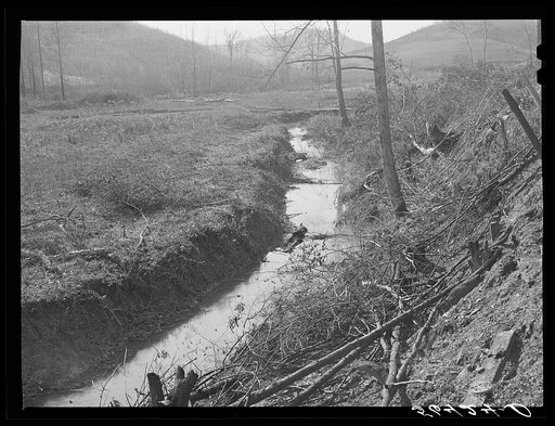 Many drainage ditches have been made and creeks cleaned out and land cleared on the creek bottom land of the farms of FSA (Farm Security Administration) borrowers. Southern Appalachian Project near Barbourville, Knox County, Kentucky