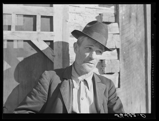 Untitled photo, possibly related to: Noah Garland sitting on the steps of his son's home. Southern Appalachian Project near Barbourville, Knox County, Kentucky