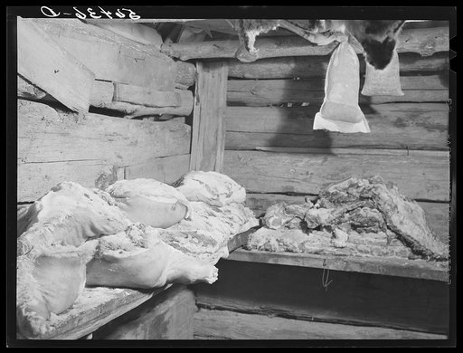 Some of the home-raised meat in the smokehouse of Josh Calahan's farm. Southern Appalachian Project near Barbourville, Knox County, Kentucky