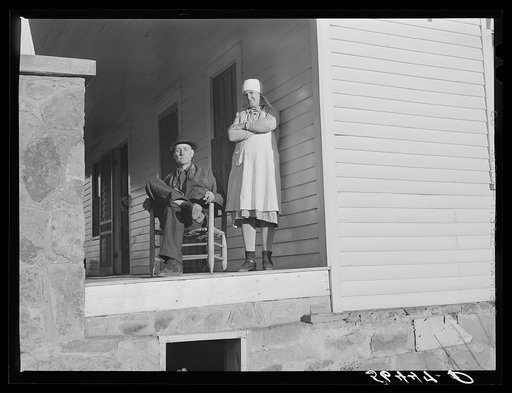 Untitled photo, possibly related to: Josh Calahan and wife on the porch of their new home. Southern Appalachian Project near Barbourville, Knox County, Kentucky