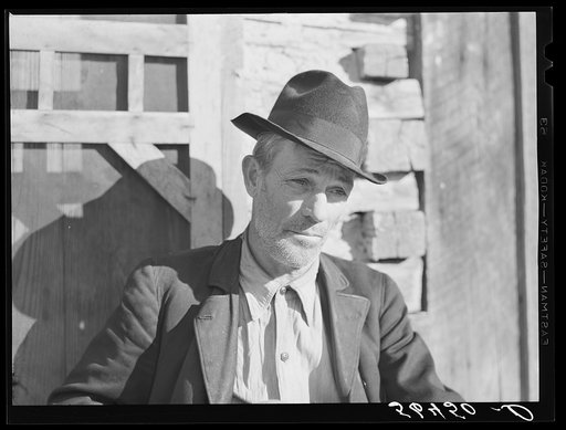 Untitled photo, possibly related to: Noah Garland sitting on the steps of his son's home. Southern Appalachian Project near Barbourville, Knox County, Kentucky