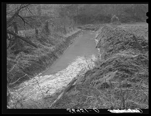 Many drainage ditches have been made and creeks cleaned out and land cleared on the creek bottom land of the farms of FSA (Farm Security Administration) borrowers. Southern Appalachian Project near Barbourville, Knox County, Kentucky