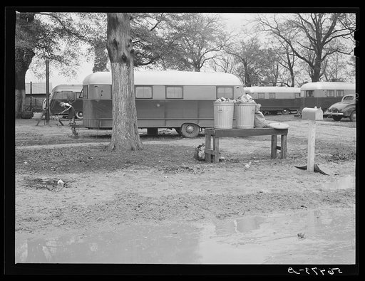 Jones Trailer Camp where Army men and construction workers and their families live. They pay two dollars and fifty cents weekly for space only. One said "It's nothing but a mud hole, only running wate, you can't find a decent place to live in Columbus and nobody will allow children in their homes. I