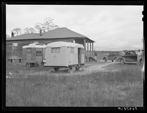 Untitled photo, possibly related to: Mr. Luigi De Angelis, who works in Belair Construction job building defense housing project. He came from Lexington, Virginia and lives alone in trailer and pays two dollars a week for space and electricity in yard of local boarding house on highway near Fort Ben