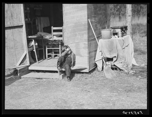 Untitled photo, possibly related to: Mrs. M.C. Ray from Mangum, Louisiana. Wife of construction worker at Camp Livingston who had been farming but came out here to make more money. The whole family has had flu. When they first arrived they had to sell their car so they can't get to Alexandria too of