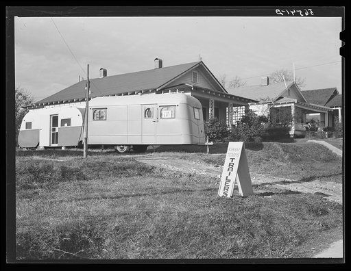 Trailer for sale in yard of private dwelling on No. 165 highway in Alexandria, Louisiana, on way to Fort Beauregard