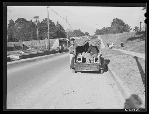 Untitled photo, possibly related to: Car converted into truck with benches for family and a carryall. Alexandria, Louisiana