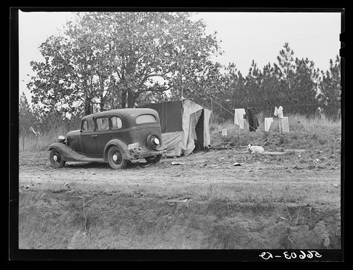 Untitled photo, possibly related to: Construction worker's family Texas sleeping in car; cook and eat in lean-to. Near Camp Claiborne, Alexandria, Louisiana