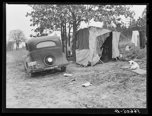 Untitled photo, possibly related to: Construction worker's family Texas sleeping in car; cook and eat in lean-to. Near Camp Claiborne, Alexandria, Louisiana