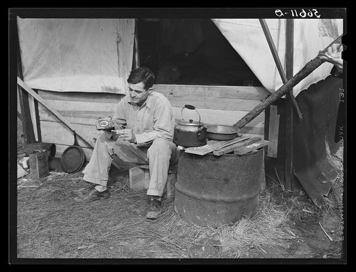 Untitled photo, possibly related to: D.C. Lovelady in front of tent. He drives a truck at Camp Livingston construction job and is from Monroe, Louisiana