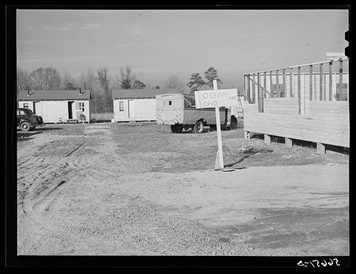 New buildings for use of construction workers on Camp Clairborne job.  Eight dollars and fifty cents for lodging and board (several people in one room). Property in this section now priced at two hundred dollars per acre. Gas station attendant says different people own every fifty feet. Alexandria, 