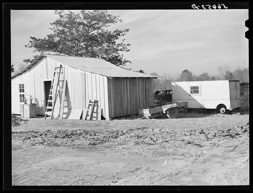 New buildings for use of construction workers on Camp Clairborne job.  Eight dollars and fifty cents for lodging and board (several people in one room). Property in this section now priced at two hundred dollars per acre. Gas station attendant says there is a different owner every fifty feet. Alexan