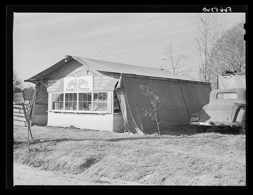 Untitled photo, possibly related to: Carl's Cafe and lunchroom tent put up about three months ago. Plate lunch increases from twenty-five cents to thirty-five cents and dinners from thirty-five cents to fifty cents. Alexandria, Louisiana