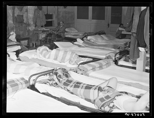 Untitled photo, possibly related to: Flophouse of about thirty-seven beds at fifty cents each, constantly crowded with construction workers sleeping in several shifts. Some of them had flu. Alexandria, Louisiana