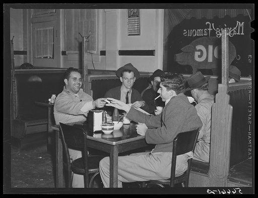 Untitled photo, possibly related to: Construction workers eating in cafe in Alexandria; they say food is up at least one third. Often prices doubled for meals