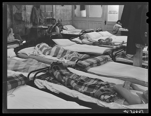 Untitled photo, possibly related to: Flophouse of about thirty-seven beds at fifty cents each, constantly crowded with construction workers sleeping in several shifts. Some of them had flu. Alexandria, Louisiana