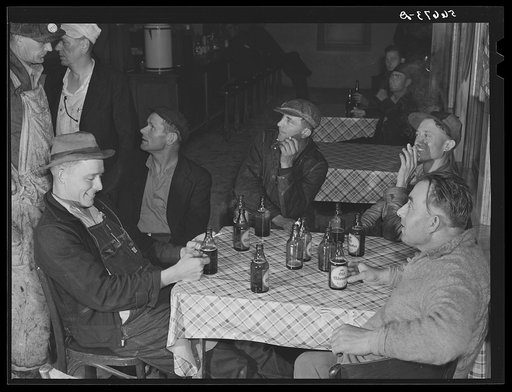 Finnish construction workers from New York, drinking beer and spending their leisure time in a new cafe near Camp Blanding. They were unable to work because of the heavy rains. Starke, Florida
