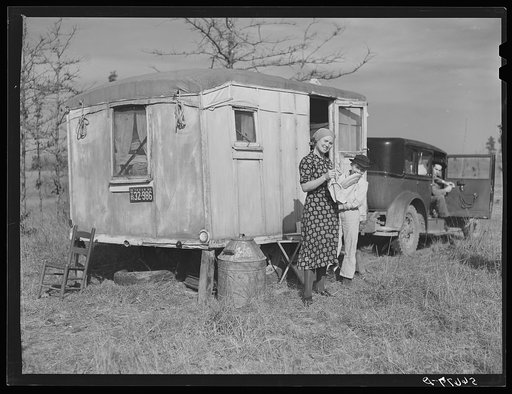 Untitled photo, possibly related to: Reverend Bullard, preacher, and family with trailer home. Alexandria, Louisiana