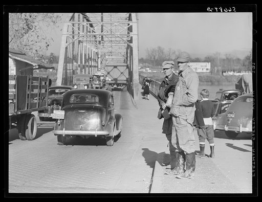 Untitled photo, possibly related to: Construction workers waiting on highway in Alexandria to catch rides to Camp Livingston job. Louisiana