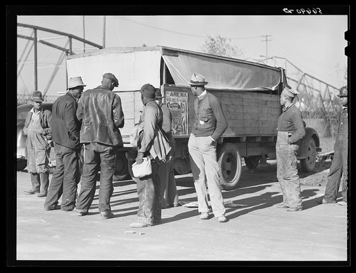 Negro construction workers waiting by truck to go to work on Camp Livingston jobs. Alexandria, Louisiana