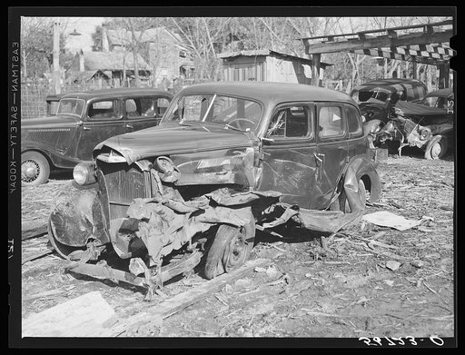 Untitled photo, possibly related to: Wrecked car of construction worker. Starke, Florida