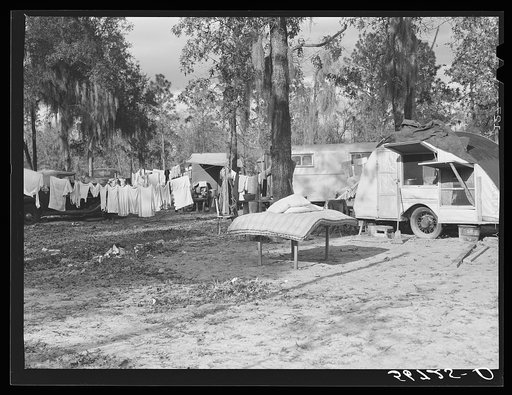 Construction workers drying out bedding and mattress from their trailer after a week of heavy rains. Alexandria, Louisiana