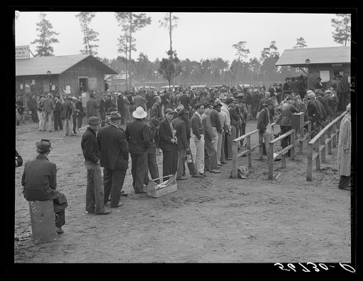 Untitled photo, possibly related to: Carpenters and construction workers waiting outside Florida state employment office trying to get jobs on Camp Blanding. Starke, Florida