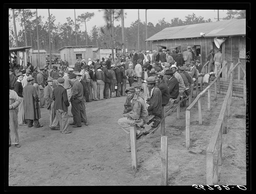 Untitled photo, possibly related to: Carpenters and construction workers waiting outside Florida state employment office trying to get jobs on Camp Blanding. Starke, Florida