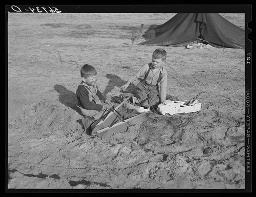 Construction worker's children playing in front of their shacks and tents near Camp Blanding. Starke, Florida