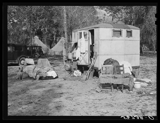 Construction workers drying out bedding and mattresses from their trailer after a week of heavy rains and winds. Near Camp Livingston, Alexandria, Louisiana