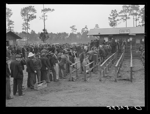 Carpenters and construction workers waiting outside Florida state employment office trying to get jobs on Camp Blanding. Starke, Florida