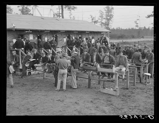 Carpenters and construction workers waiting outside Florida state employment office trying to get jobs on Camp Blanding. Starke, Florida
