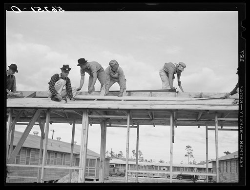 Carpenters constructing new Army barracks at Camp Blanding. Starke, Florida