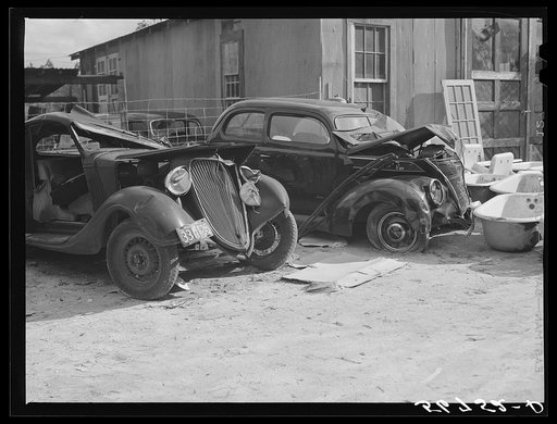 Wrecked cars of construction workers. Starke, Florida