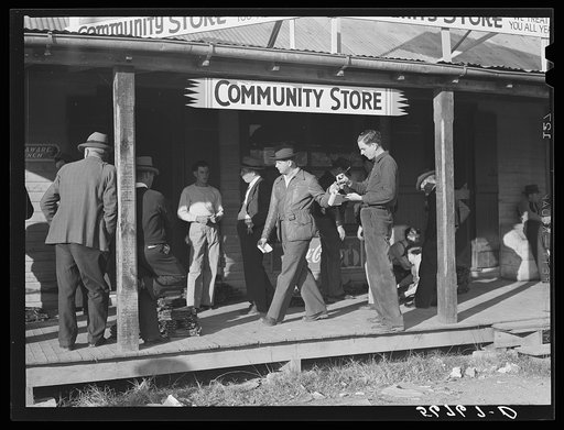 FSA (Farm Security Administration) supervisor taking bids at muskrat pelt auction. Delacroix Island, Saint Bernard, Louisiana