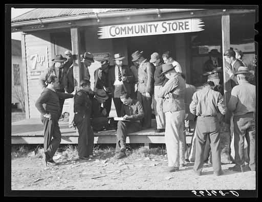 Untitled photo, possibly related to: FSA (Farm Security Administration) supervisor taking bids at muskrat pelt auction. Delacroix Island, Saint Bernard, Louisiana