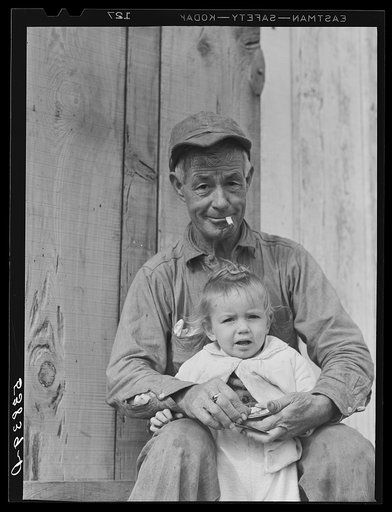 Untitled photo, possibly related to: Spanish muskrat trapper by his camp in the marshes. Delacroix Island, Saint Bernard Parish, Louisiana