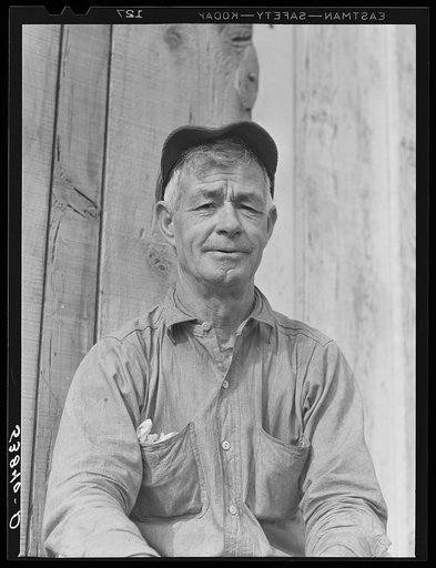 Spanish muskrat trapper by his camp in the marshes. Delacroix Island, Saint Bernard Parish, Louisiana