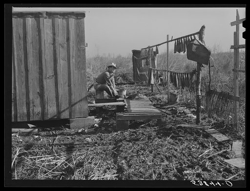 Muskrat skins hanging up to dry by Spanish trapper's home in the marshes. He then takes the furs to the island to sell. Delacroix Island, Saint Bernard Parish, Louisiana
