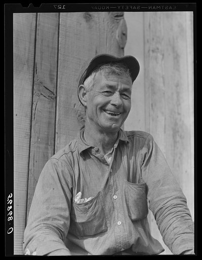 Spanish muskrat trapper by his camp in the marshes. Delacroix Island, Saint Bernard Parish, Louisiana