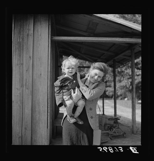 Untitled photo, possibly related to: Child of construction worker who had been employed on Camp Blanding job. Starke, Florida