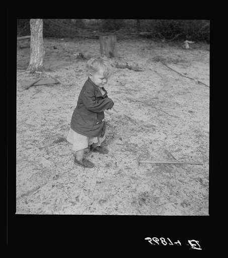 Untitled photo, possibly related to: Child of construction worker who had been employed on Camp Blanding job. Starke, Florida