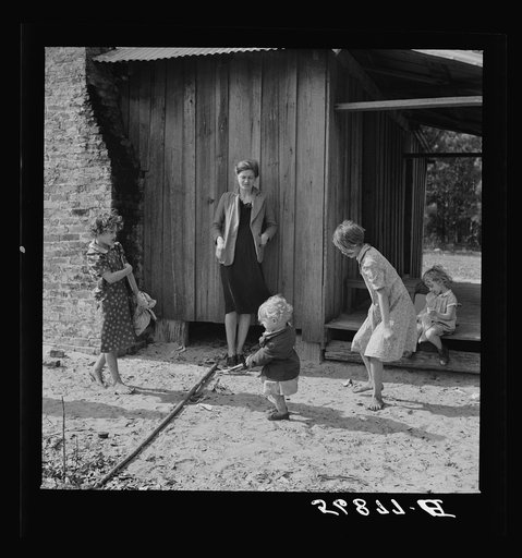 Untitled photo, possibly related to: Child of construction worker who had been employed on Camp Blanding job. Starke, Florida