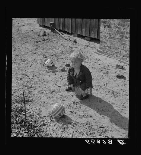 Untitled photo, possibly related to: Child of construction worker who had been employed on Camp Blanding job. Starke, Florida