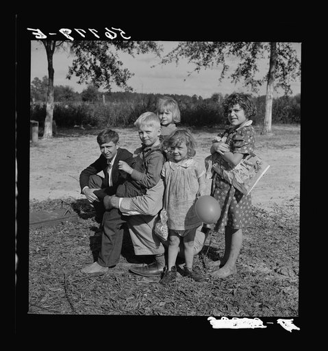 Untitled photo, possibly related to: Family of construction worker who had been employed on Camp Blanding job. Starke, Florida