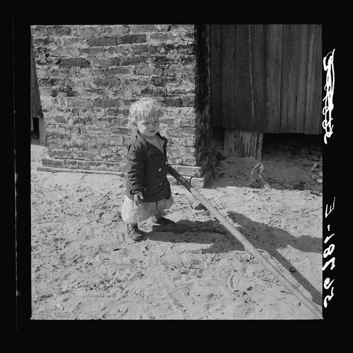 Untitled photo, possibly related to: Child of construction worker who had been employed on Camp Blanding job. Starke, Florida
