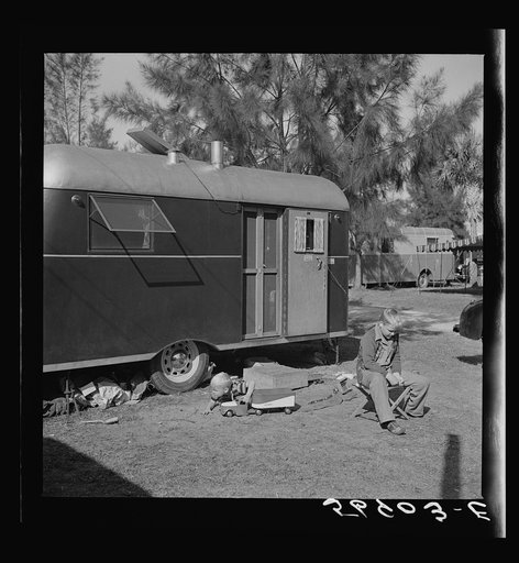Untitled photo, possibly related to: Playing outside trailer home. Sarasota trailer park, Sarasota, Florida