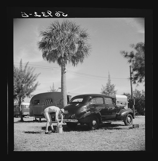 Guest at Sarasota trailer park, Sarasota, Florida, washing his car