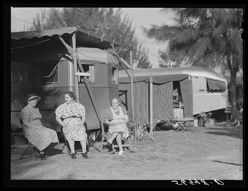 Sitting outside trailer in Sarasota trailer park. Sarasota, Florida