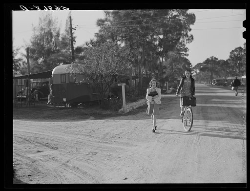 Students coming home from school in the afternoon. Sarasota trailer park, Sarasota, Florida